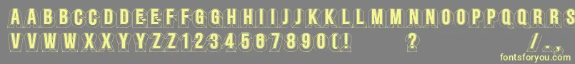 Minstrels Font – Yellow Fonts on Gray Background