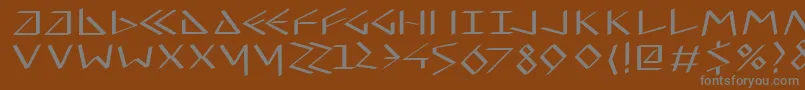 Шрифт Virtualuncialquill – серые шрифты на коричневом фоне