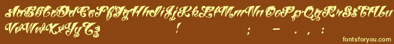 Шрифт VtcTattooscriptthree – жёлтые шрифты на коричневом фоне