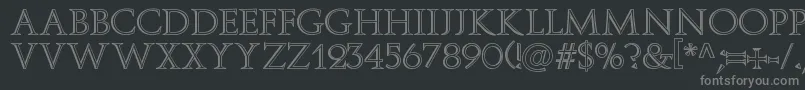 Delfin-fontti – harmaat kirjasimet mustalla taustalla
