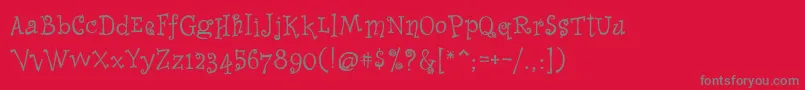 フォントWhimsyIcg – 赤い背景に灰色の文字