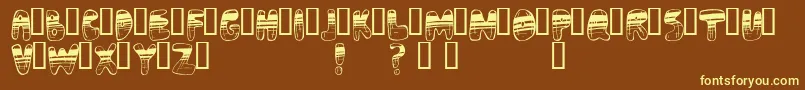 Adrenochrome-fontti – keltaiset fontit ruskealla taustalla