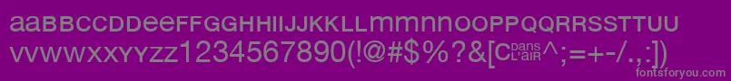 CDansLair-fontti – harmaat kirjasimet violetilla taustalla