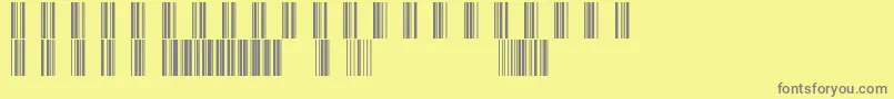 フォントBarcod39 – 黄色の背景に灰色の文字