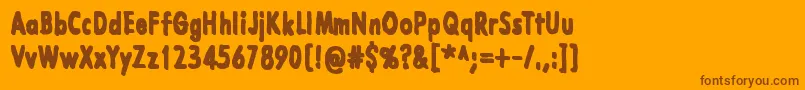 LazarusOzKolsvart Font – Brown Fonts on Orange Background