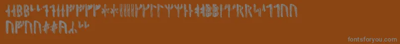 Nidhoggrunic Font – Gray Fonts on Brown Background