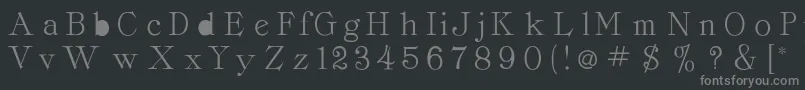 Pccordellaroman-fontti – harmaat kirjasimet mustalla taustalla