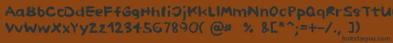 PaintHandLimitedSet Font – Black Fonts on Brown Background
