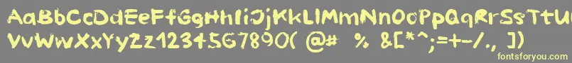 PaintHandLimitedSet-Schriftart – Gelbe Schriften auf grauem Hintergrund