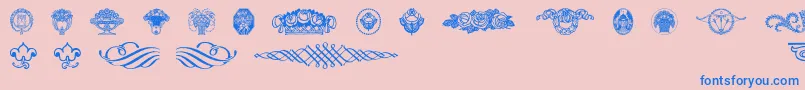 フォントWieynkfrakturvignetten – ピンクの背景に青い文字