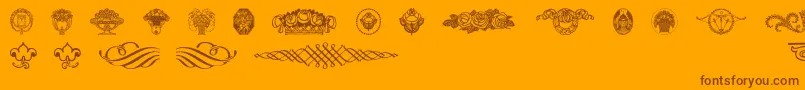 Wieynkfrakturvignetten-Schriftart – Braune Schriften auf orangefarbenem Hintergrund