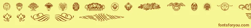 Weitere Informationen zur Wieynkfrakturvignetten-Schriftart Wieynkfrakturvignetten-Schriftart – Braune Schriften auf gelbem Hintergrund