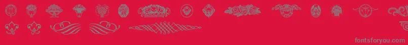 Wieynkfrakturvignetten-Schriftart – Graue Schriften auf rotem Hintergrund