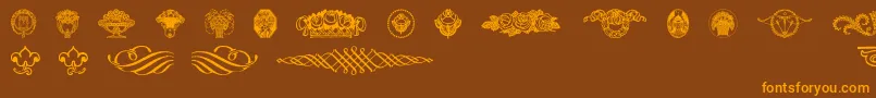 Czcionka Wieynkfrakturvignetten – pomarańczowe czcionki na brązowym tle