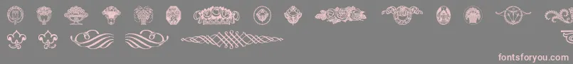 フォントWieynkfrakturvignetten – 灰色の背景にピンクのフォント