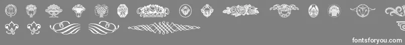 Weitere Informationen zur Wieynkfrakturvignetten-Schriftart Wieynkfrakturvignetten-Schriftart – Weiße Schriften auf grauem Hintergrund