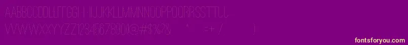 OstrichSansDashedMedium Font – Yellow Fonts on Purple Background