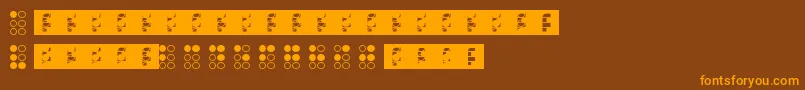 フォントBraillefont – オレンジ色の文字が茶色の背景にあります。