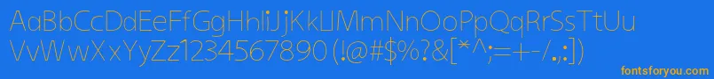 KiddysansLight Font – Orange Fonts on Blue Background