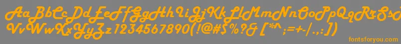 フォントStPlatinumBlonde – オレンジの文字は灰色の背景にあります。