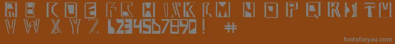 Abstract ffy-fontti – harmaat kirjasimet ruskealla taustalla