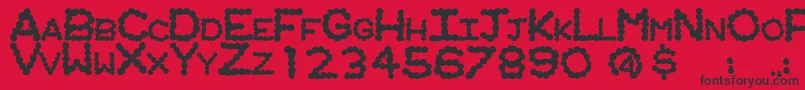 Fonte RingwormRegular – fontes pretas em um fundo vermelho