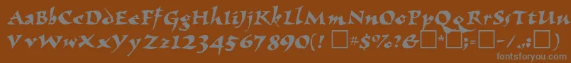 ElbjorgScript Font – Gray Fonts on Brown Background