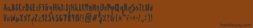 Regolith1 Font – Black Fonts on Brown Background