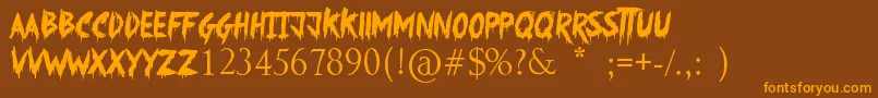 SomethingStrange Font – Orange Fonts on Brown Background
