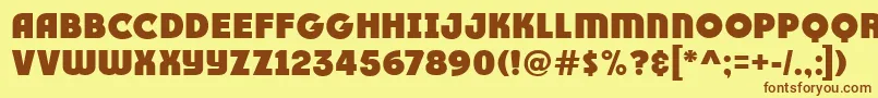 フォントRace1BranntPlusNcv – 茶色の文字が黄色の背景にあります。