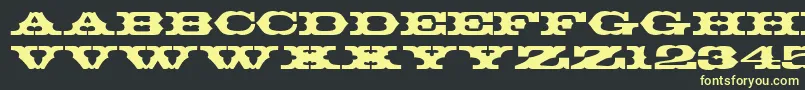 T720DecoRegular Font – Yellow Fonts on Black Background