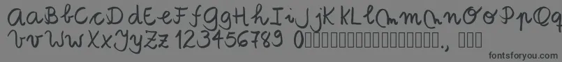 フォントTanaestelbrushscript01Regular – 黒い文字の灰色の背景