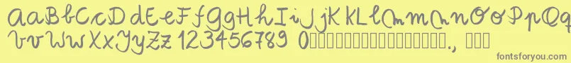Tanaestelbrushscript01Regular Font – Gray Fonts on Yellow Background