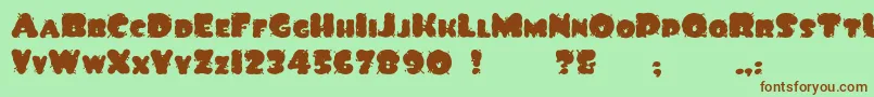 SpiltInk Font – Brown Fonts on Green Background