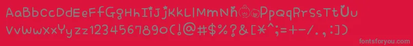 フォントHomekorro – 赤い背景に灰色の文字