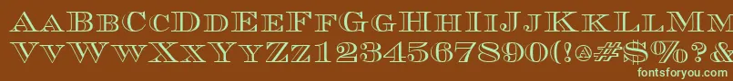 フォントCurrencyoutlineRegular – 緑色の文字が茶色の背景にあります。