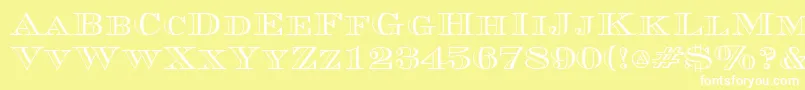 Czcionka CurrencyoutlineRegular – białe czcionki na żółtym tle