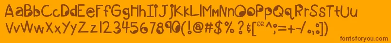 Kbgoogleyeyes Font – Brown Fonts on Orange Background