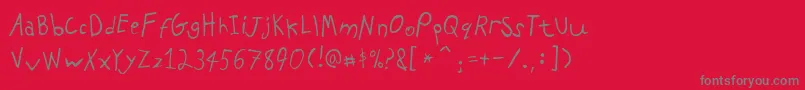 PfkidsAgefive-Schriftart – Graue Schriften auf rotem Hintergrund