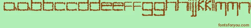 YbHybrid-fontti – ruskeat fontit vihreällä taustalla