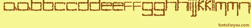 YbHybrid-fontti – ruskeat fontit keltaisella taustalla