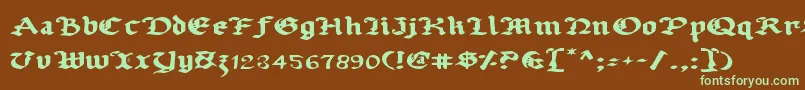 フォントUberv2e – 緑色の文字が茶色の背景にあります。