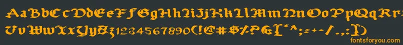 フォントUberv2e – 黒い背景にオレンジの文字