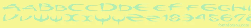 フォントMyquestr – 黄色い背景に緑の文字