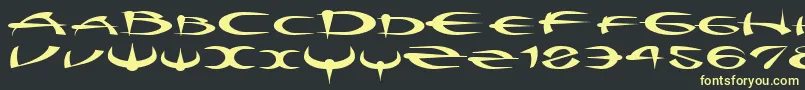 フォントMyquestr – 黒い背景に黄色の文字