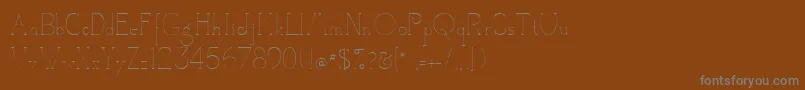 フォントCamelotdenada – 茶色の背景に灰色の文字