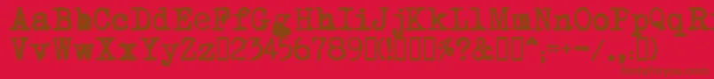 MomРѕt Font – Brown Fonts on Red Background