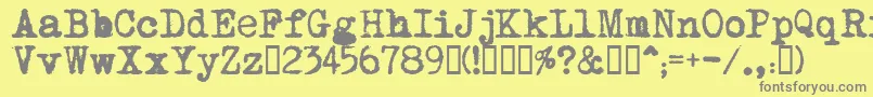 MomРѕt Font – Gray Fonts on Yellow Background