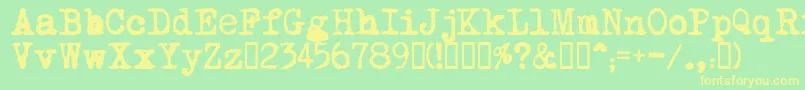 MomРѕt Font – Yellow Fonts on Green Background