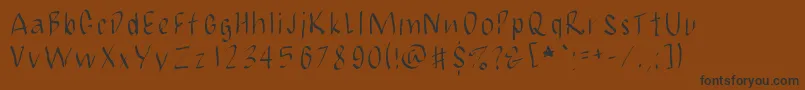 JbmCalligrad Font – Black Fonts on Brown Background